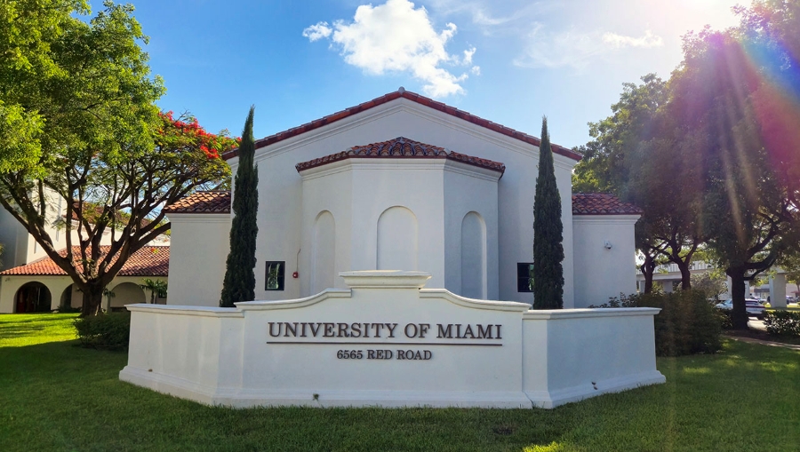 Outside shot of The Chapel at University of Miami, 6565 Red Road address shows on the sign.